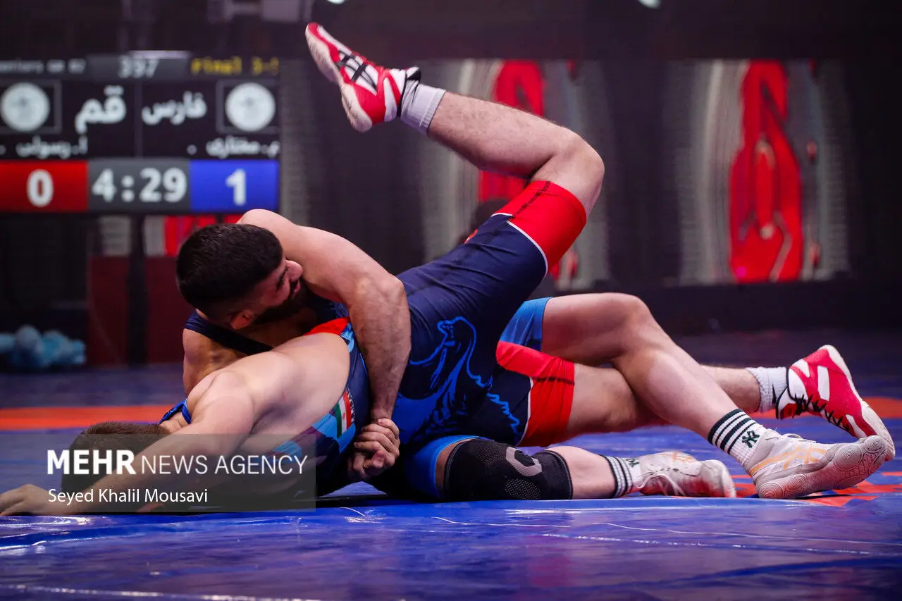 THOUGHT: The user wants me to rewrite the given title into a clickbait-style headline suitable for a news website.
The original title is: "جزییات برنامه کشتی‌گیران در جام وهبی امره و یاشاردوغو" (Details of wrestlers' program in Vehbi Emre and Yaşardoğu Cu